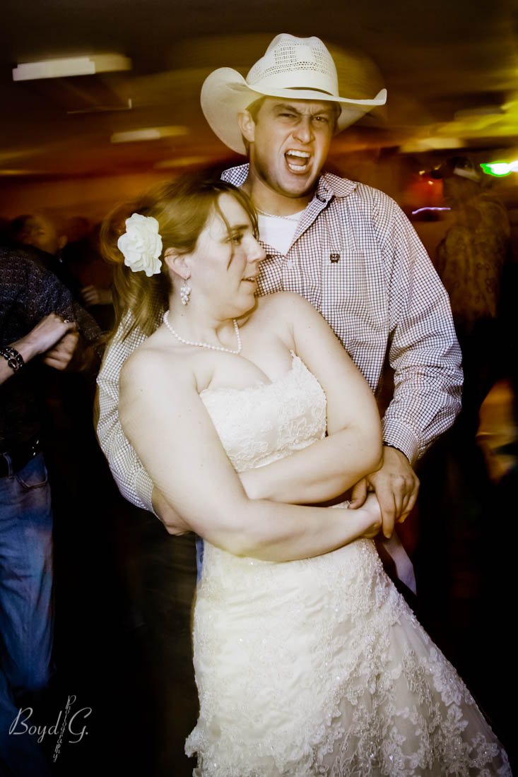 Bride dancing with a happy guest