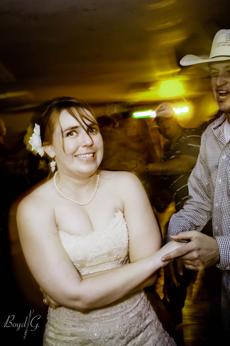 Bride looking a bit scared with her happy guest